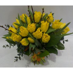 Yellow tulip bouquet with cherry branches
